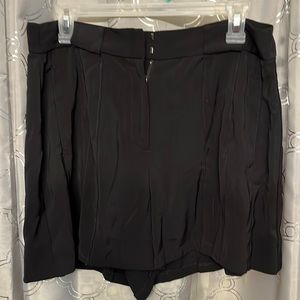 Jennifer Lopez size 12 black dress shorts slimming front seam pockets